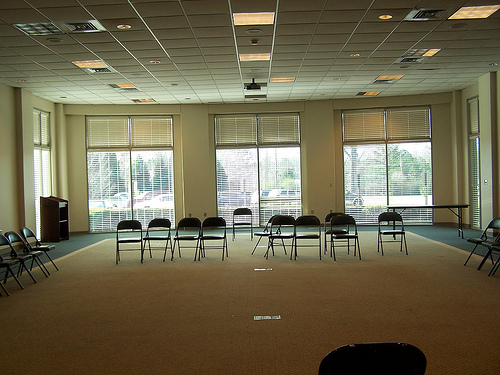 Picture of meeting room with chairs and windows