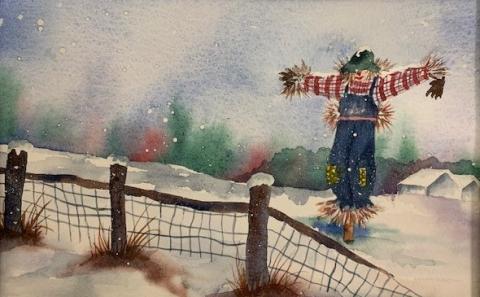 scarecrow in a snowy field