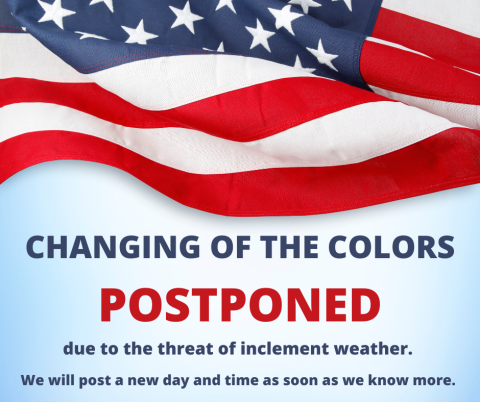 American flag with postponement notice.